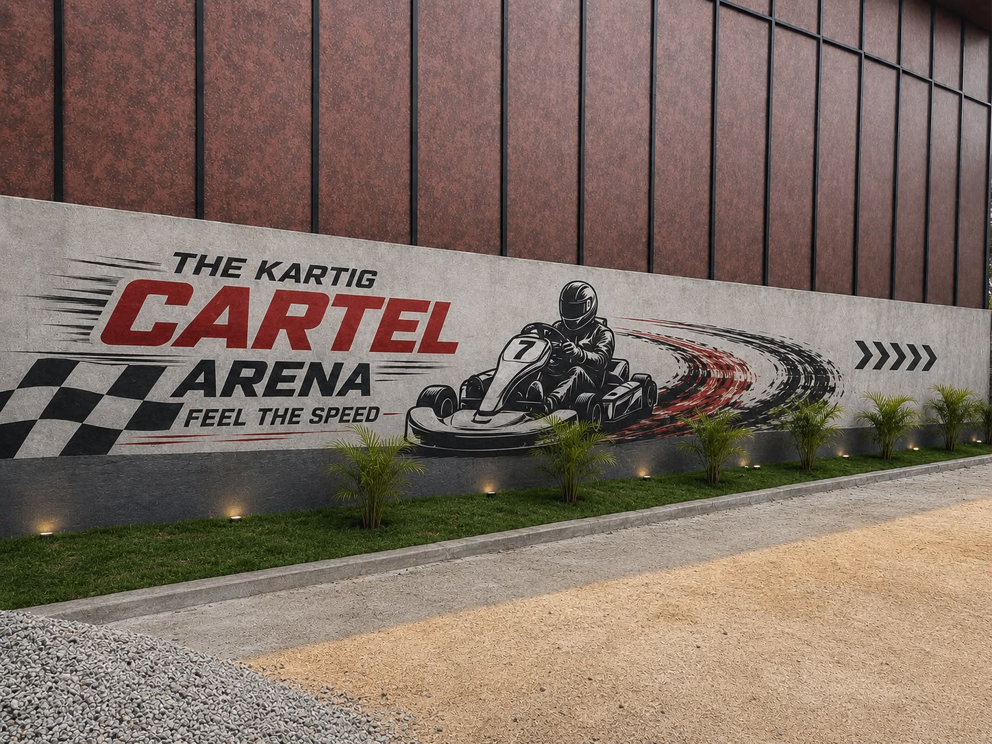 The Karting Cartel perimeter wall, with a kart mid-corner